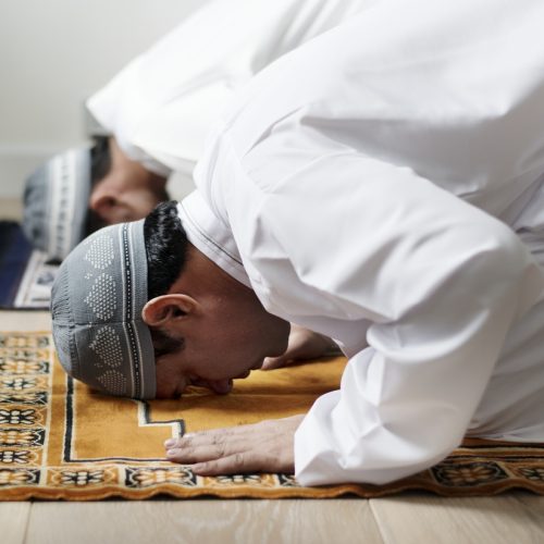 Muslim men praying during Ramadan